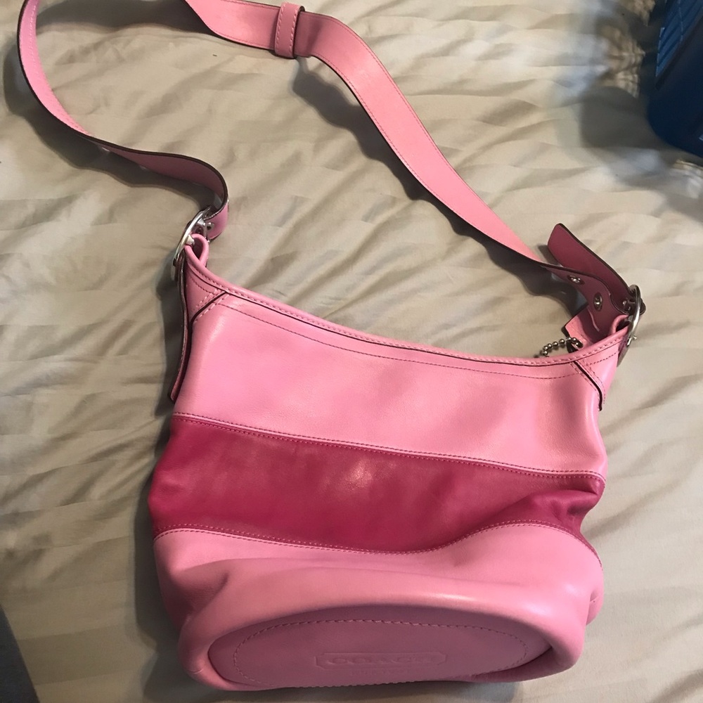 Coach two tone pink purse. GUC no damage seen. Semi no as is, no dust bag.